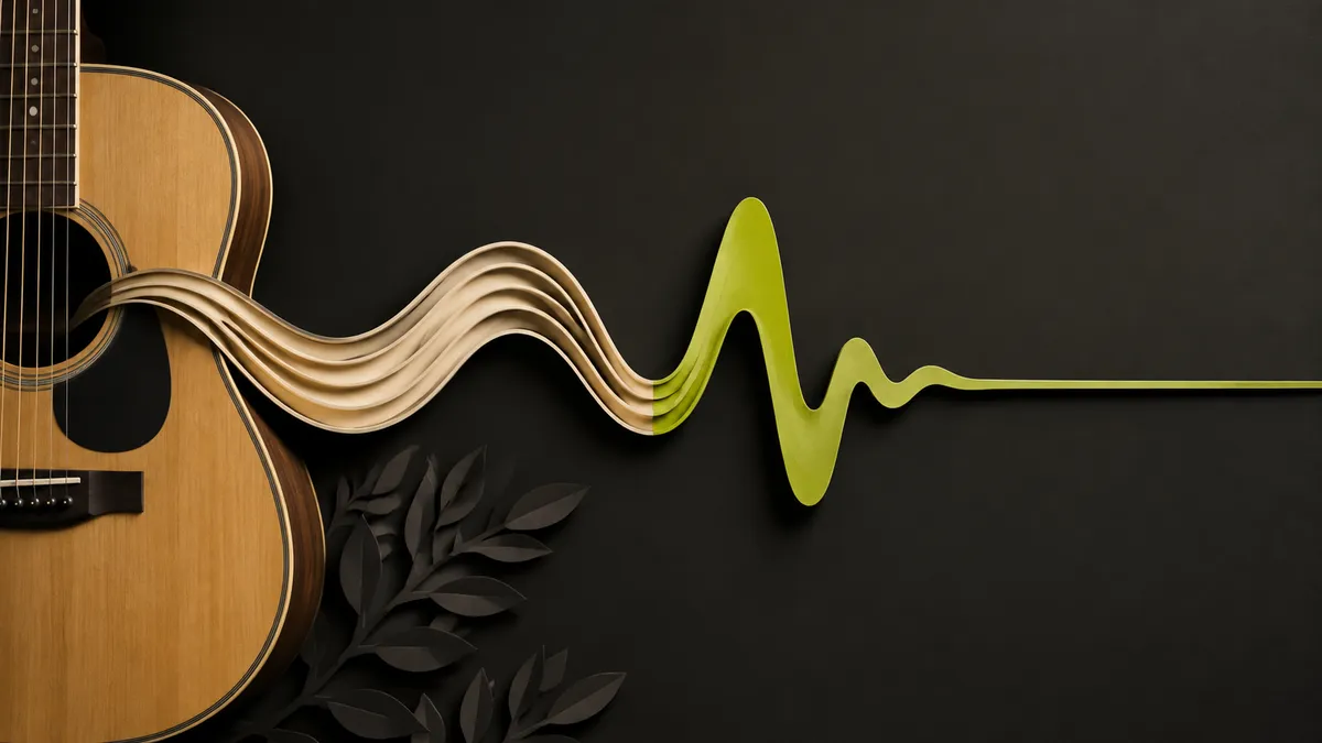 Sustained sound ribbon coming to rest beside a guitar